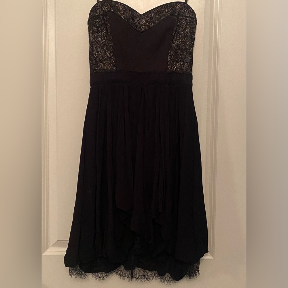 BCBG Max Azria womens XXS black dress with gold at bodice, lined, boning at bust